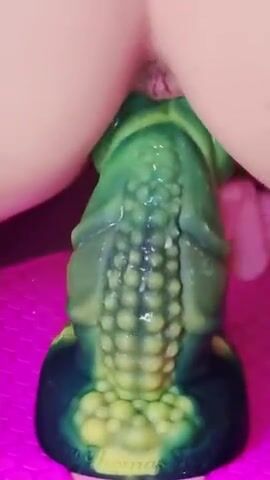 The Alien beast is a girthy monster which makes my cunt twitch and ripple as he stretches me out