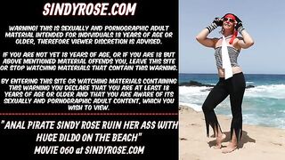 Anal pirate Sindy Rose ruin her ass with huge dildo on the beach